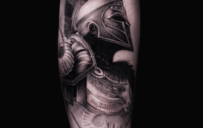 Black and grey realism tattoo of an ancient soldier