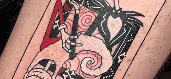 Tattoo of Jack from &ldquo;The Nightmare Before Christmas,&rdquo; designed as a stylized Jack of Hearts playing card.