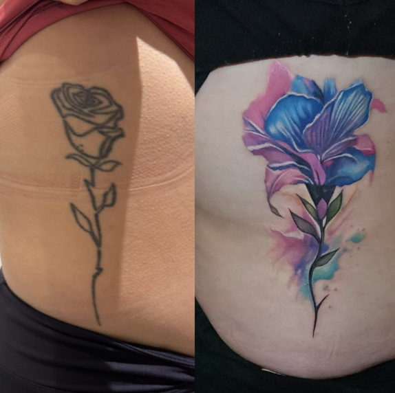 A before-and-after comparison of a torso tattoo. The left shows a simple, black-outline rose with a long stem. The right shows the cover-up: a vibrant, watercolor-style flower in shades of blue and purple with soft pink and teal splashes around the edges.